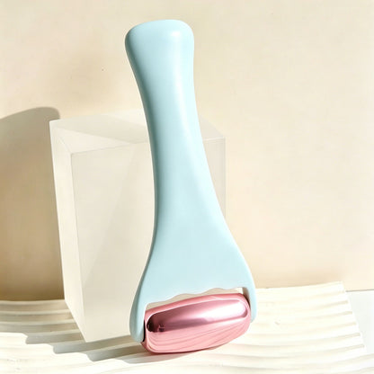 Rouleau de massage en m�tal dor� rose pour le visage et le corps, th�rapie par le froid