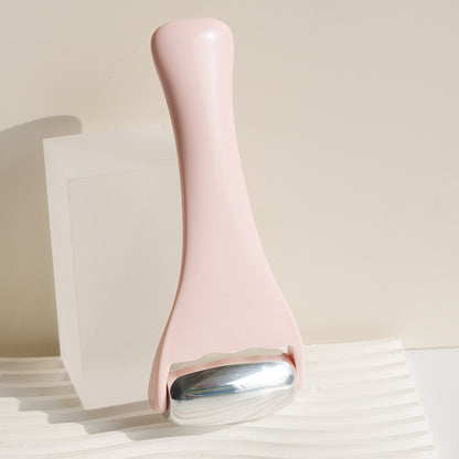 Rouleau de massage en m�tal dor� rose pour le visage et le corps, th�rapie par le froid