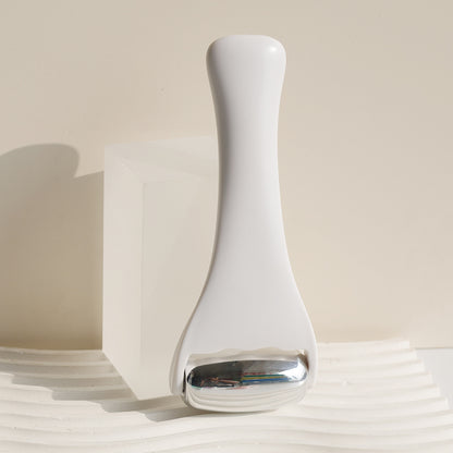 Rouleau de massage en m�tal dor� rose pour le visage et le corps, th�rapie par le froid