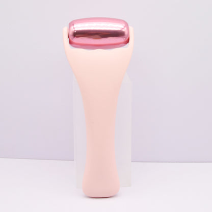 Rouleau de massage en m�tal dor� rose pour le visage et le corps, th�rapie par le froid